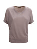 T-shirt rosa con dettagli a righe